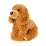 Plush dog toy with brown fur on a white background