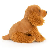 Plush brown cocker spaniel dog toy on a white background