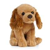 Plush toy cocker spaniel dog with floppy ears on a white background
