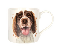Brown and white painting of a springer spaniel on a white mug