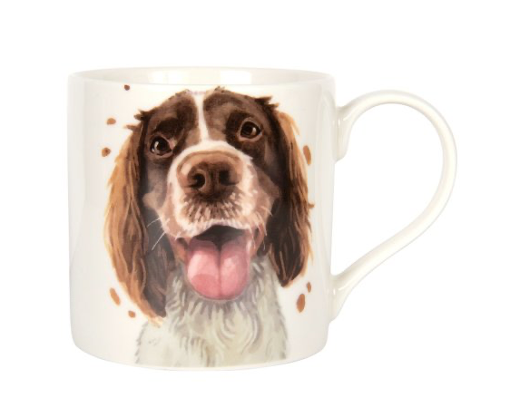 Brown and white painting of a springer spaniel on a white mug