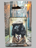 Peaky Paws Club fridge magnet packaging on a brown leather background