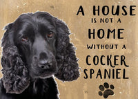 Black Cocker Spaniel with text 'A house is not a home without a Cocker Spaniel' on a brown background