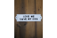 Love Me Love My Dog Cast Iron Sign displayed